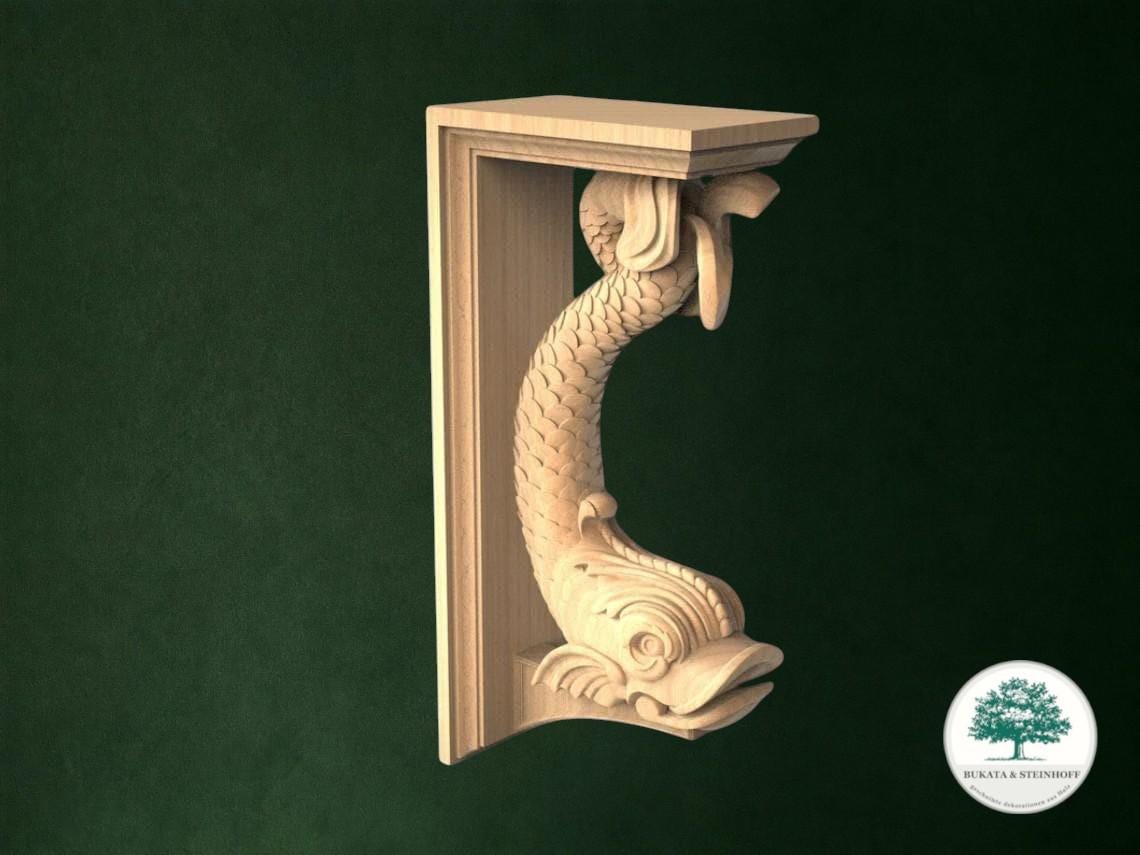 a carved wooden fish-shaped bracket or molding, which is attached to a wall.