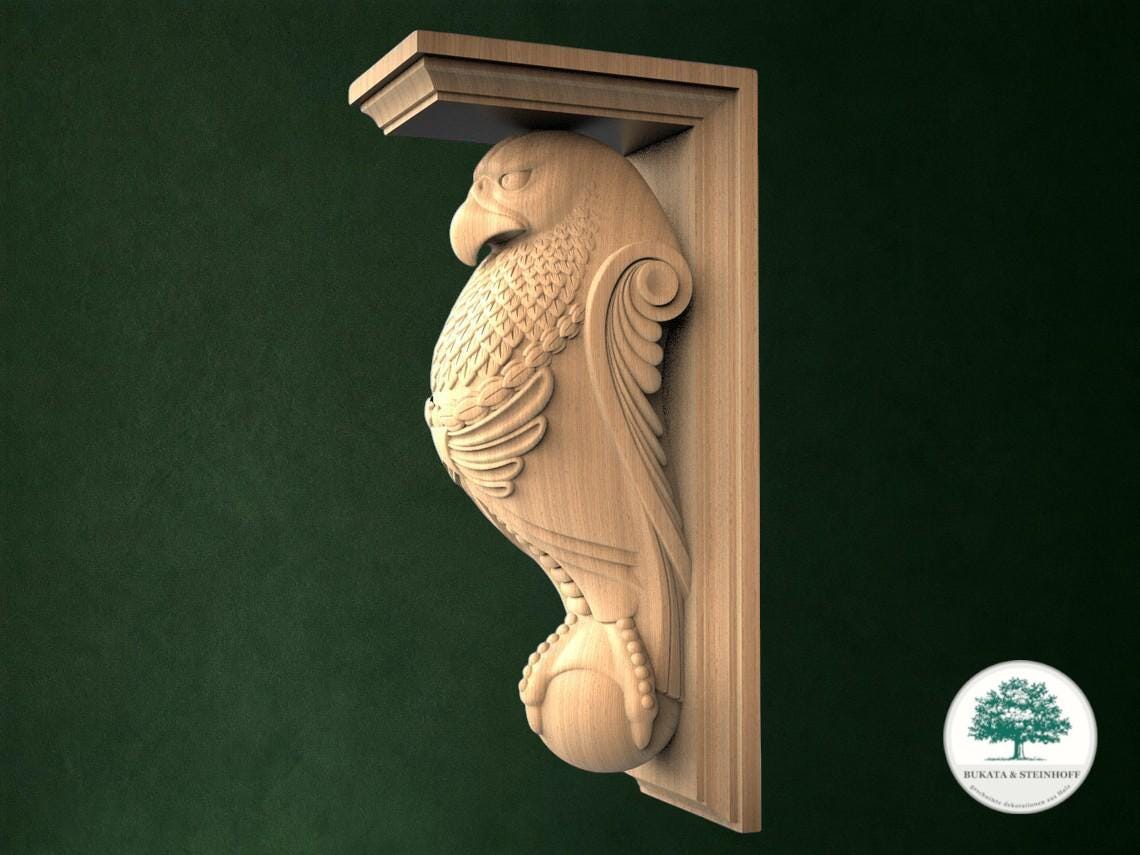 A wooden carving of a bird, possibly a hawk or an eagle, is mounted on a wall.