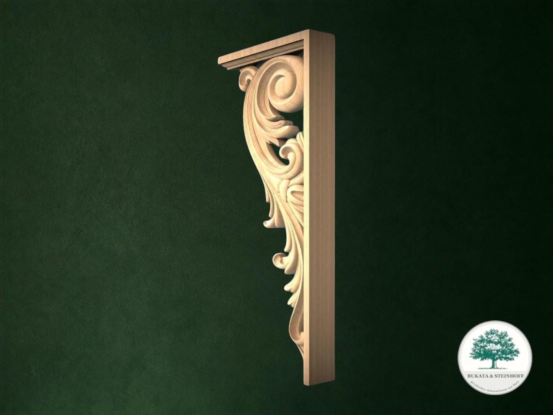 a decorative wooden bracket with an ornate, swirling design on a dark green background.