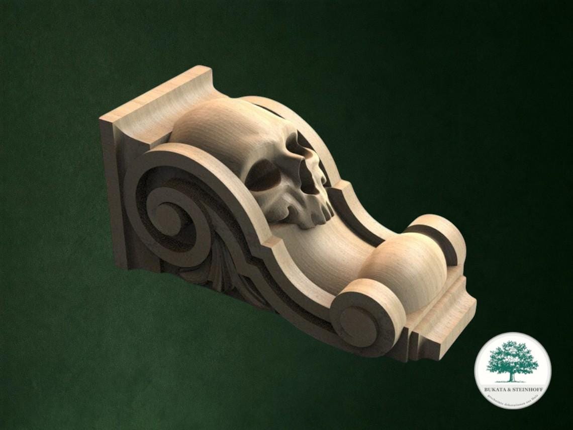 A carved wooden sculpture of a skull is displayed against a dark green background.