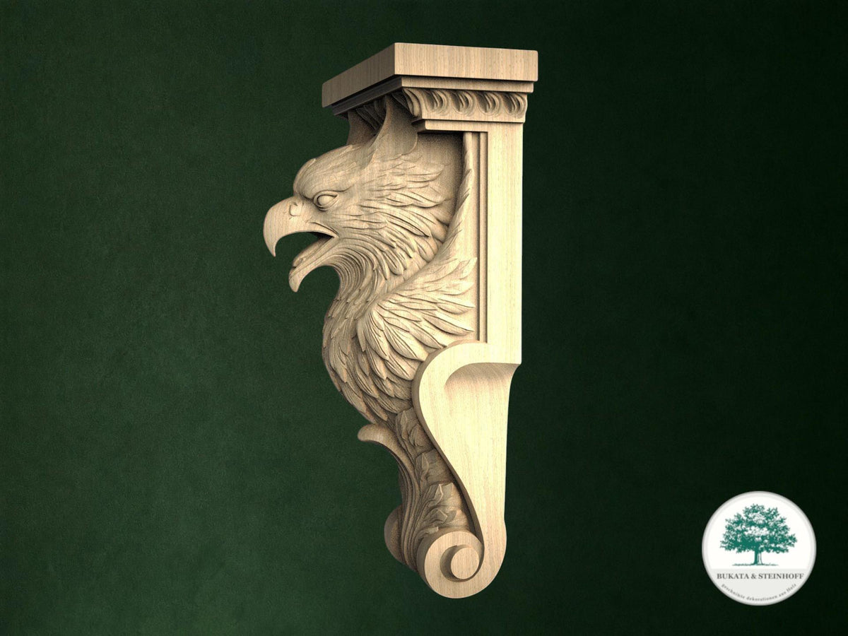 A carved wooden eagle or phoenix-like figure with a carved head and wings, mounted on a wooden post or bracket against a dark green background.