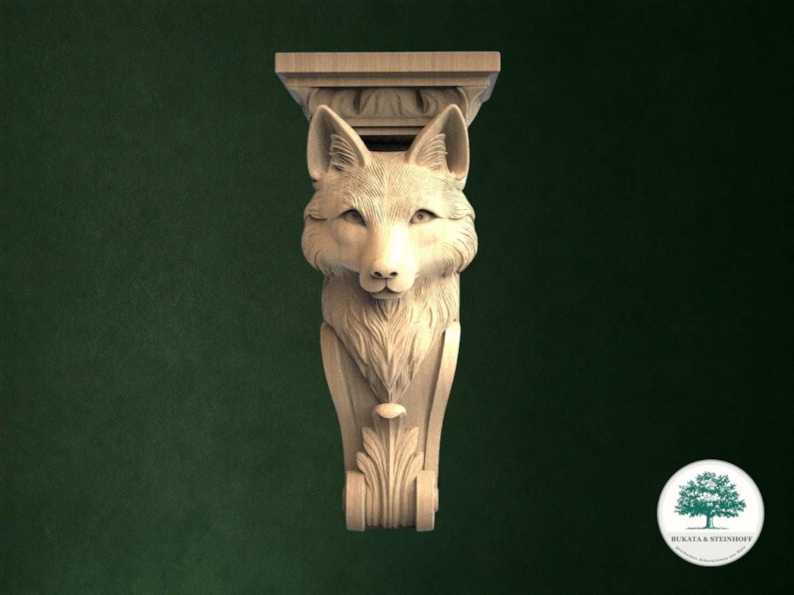 A carved wooden sculpture of a fox's head mounted on a wall.